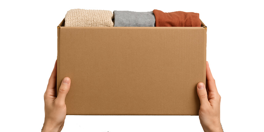 Box of branded garments arranged to promote free delivery on orders over £99.